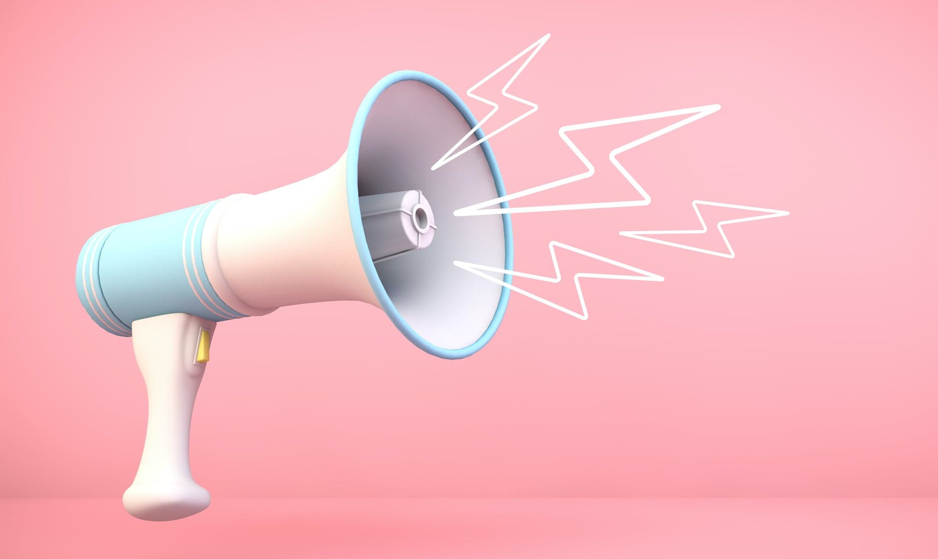 Megafon mot rosa bakgrund